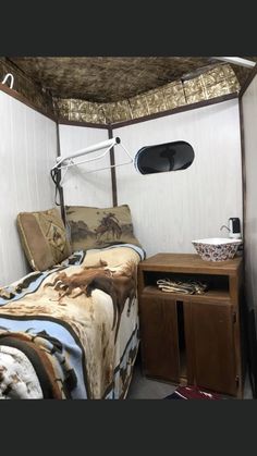 a bed sitting in the corner of a room