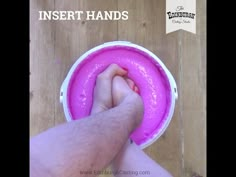 a person holding their foot in front of a pink bowl with the words insert hands on it