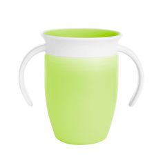 a green cup with white rim and handle