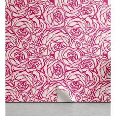 a pink and white wallpaper with flowers on it