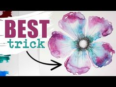 the words best trick are painted in front of an image of watercolors and flowers