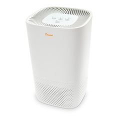 a white air purifier sitting on top of a table