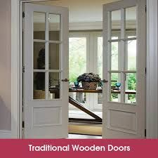 an open door with the words traditional timber doors