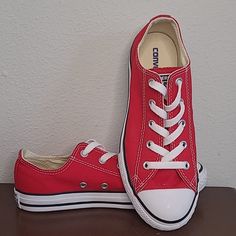 Size 2.5 Red Converse Low Top. Nwot! Very Clean Classic Red Low Tops With White Laces, A Few Small Discoloration Spots On The Laces, But Hardly Noticable. Aka Chucks Or Chuck Taylor Casual Red Sneakers For Spring, Red High-top Canvas Shoes For Spring, Red Canvas Shoes For Spring Streetwear, Red Canvas Shoes For Sports With Round Toe, Red Canvas Shoes With Round Toe For Sports, Casual Red High-top Canvas Shoes, Red Low-top Canvas Shoes For Sports, Red Sporty Canvas Shoes For Sports, Casual Low-top Sneakers With Red Accents