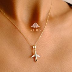 "14K Gold Airplane Necklace, Airplane Pendant, Tiny Airplane Charm, Dainty Gold Plane Necklace, Travel Jewelry, Pilots Flight Attendant Gift Features *Material: 14K Real Gold *Color Options: Yellow Gold, White Gold, Rose Gold *Metal Stamp: 14K (585) *Available Necklace Sizes: 14Inches to 20Inches  *Weight(approx) : 2.25 grams *Ready to Ship in 3-5 Business Days. FREE Express worldwide shipping. FREE Engraving service Each item is made to order. Comes in a Gift Box with 14K Gold Certificate. This Necklace Airplane, Airplane Pendant, Plane Necklace, Airplane Necklace, Gold Certificate, Mens Gold Jewelry, Fine Jewelery, Jewelry Accessories Ideas, Funky Jewelry