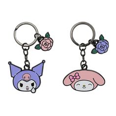 two keychains with cartoon characters on them, one is pink and the other is blue