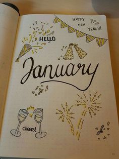 an open notebook with the word january written on it and fireworks coming out of it