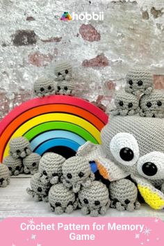 crochet pattern for memory game koala with rainbow and stars on white background