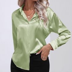 The Satin Serenity Button-Up Shirt Is A Refined And Elegant Choice For Any Occasion. With Its Collared Neck And Buttoned Front, It Exudes A Timeless Sophistication. The Satin Fabric Adds A Touch Of Luxury And A Subtle Sheen, Making It Suitable For Both Formal And Semi-Formal Settings. This Shirt Is Perfect For Creating A Polished And Put-Together Look. Material: 100% Polyester Measurements Provided Are Approximate And May Exhibit Variations From The Values Listed. S: Shoulder 16.8 In, Bust 42.1 Luxury Timeless Semi-formal Dress Shirt, Luxury Elegant Silk One-shoulder Dress, Green Satin Top With Jeans, Elegant Luxury Semi-formal Dress Shirt, Luxury Formal Dress Shirt, Luxury Solid Color Semi-formal Shirt, Luxury Green Button-up Blouse, Cheap Green Blouse With Button Closure, Green Satin Blouse