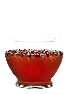 a glass bowl filled with liquid on top of a table