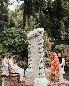 the bride and groom are getting ready to walk down the aisle at their wedding ceremony