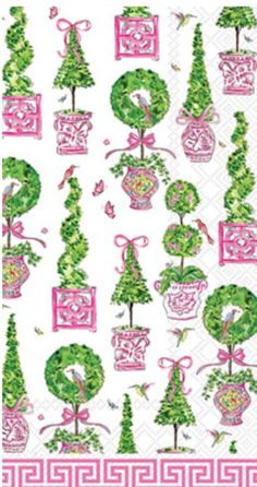 paper napkins with trees and letters on them in pink, green, and white