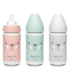 three baby bottles with animals on them