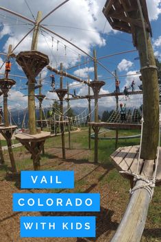 an outdoor play area with ropes, swings and climbing equipment for children to climb on