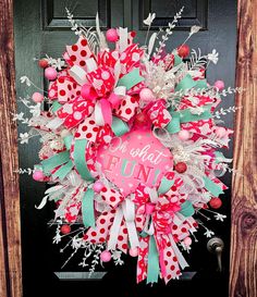 a pink and green wreath with polka dots on it that says be what you are hunt