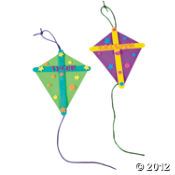 two kites are flying side by side on a white background