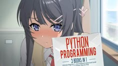 a girl holding up a sign that says python programming