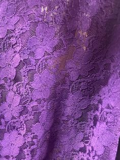 an image of purple lace fabric