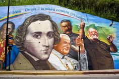 a mural painted on the side of a building depicting several different people and their names