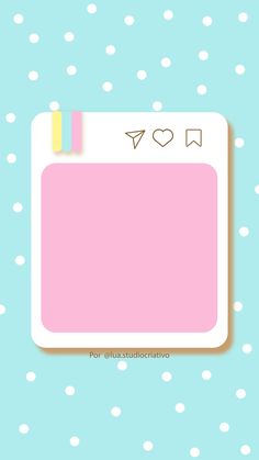 a blue and white polka dot background with a pastel pink notepad on it