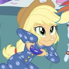 the pony is playing with her hair