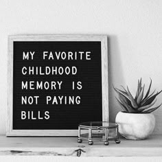 a black and white photo with the words my favorite childhood memory is not paying bills