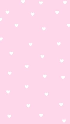 a pink background with white hearts on it