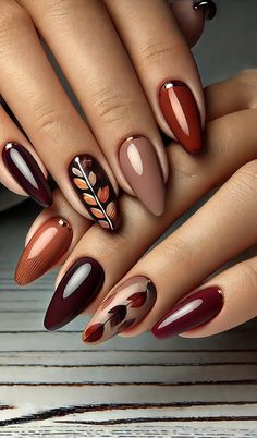 #FallNails2024 #TrendingNailDesigns #AutumnNails #BurgundyNails #FallManicure #NailArtInspiration #LeafNailArt #AlmondShapeNails #GoldAccentsNails #AutumnNailTrends #SeasonalNailDesigns #ChicNailArt #FallNails #NailInspo #NailArt #FallStyle #Fall Fall Nail Art Designs Almond Shape, Cute Nails For Fall Almond, November Nail Ideas Almond, Stilleto Fall Nail Designs, Cozy Fall Nails, Fall Burgundy Nail Designs, Maroon Nails Fall, Rust Nails Design, Fall Chrome Nails Designs