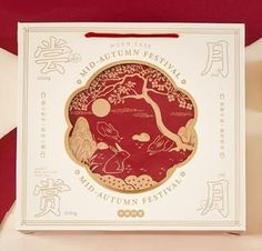 the box is open and has an image of a tree on it with chinese writing