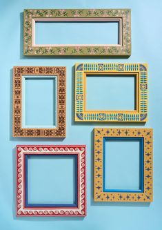 four different colored frames on a blue background