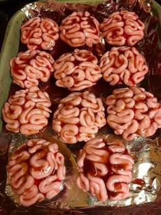 there are many pink donuts that have been made to look like human brain shapes