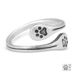 One Line Show off your dog love with this unique jewelry Overview Keep your pup close to your heart with this beautiful sterling silver toe ring handmade in the USA. Adjustable size fits most. Benefits Made from recycled sterling silver Handmade Made in the USA Why We Like It The handmade sterling silver toe ring is a special way to show off your love for your dog. This company prides itself on its use of 100% recycled sterling silver. Good For Suitable for everyone Specs Materials: 100% recycle Paw Print Ring, Paw Jewelry, Paw Ring, Fitness Jewelry, Paw Print Jewelry, Sterling Silver Toe Rings, Silver Toe Rings, Printed Jewelry, Toe Ring