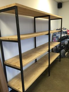 the shelves are empty and ready to be used in the garage or office area for storage