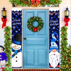 a blue front door decorated with christmas decorations