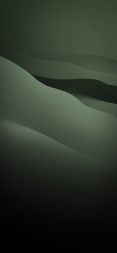 a black and white photo of sand dunes