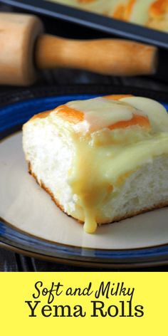 a close up of a piece of cake on a plate with the words soft and milky yemma rolls