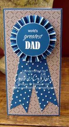 a father's day card with a blue ribbon