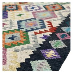 a multicolored rug with different designs on it