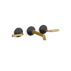 two black and gold wall mounted hooks