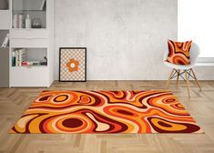 an orange and red area rug in a living room