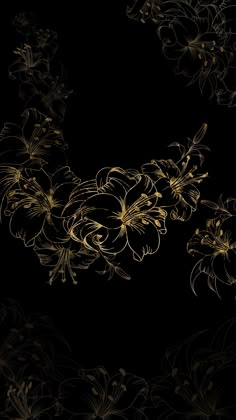 gold flowers on a black background with some reflection in the bottom right hand corner,