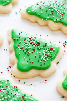 green and white decorated cookies with sprinkles