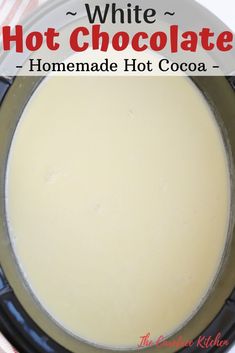 a pan filled with white chocolate on top of a table next to a red and white checkered cloth