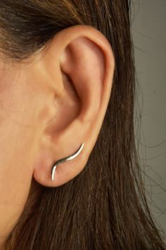 🖤BelleCharmedStore. Selling High-Quality Handmade Earrings that last a lifetime 🖤 100% Stainless Steel ��✔️ Tarnish Proof ✔️ Will Not Discolor ✔️ Free Delivery ✔️ BelleCharmedStore Curved Ear Climbers offer a sleek, elegant design that hugs your ear perfectly, combining style and comfort with a modern touch. These versatile climbers add a sophisticated edge to any outfit, ideal for daily wear or special occasions. Lightweight and trendy, they ensure you'll make a subtle yet impactful statement. Unique Ear Cuffs, Ear Climbers, Ear Jacket, Ear Cuffs, Handmade Earrings, Favorite Jewelry, Elegant Design, Ear Cuff, Women's Accessories