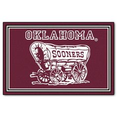 a maroon and white door mat with the word,'oklahoma sonders'on it