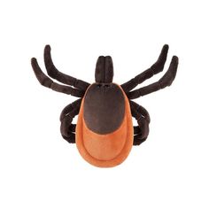 an orange and black spider stuffed animal on a white background