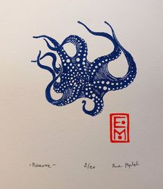 an octopus is depicted on a piece of paper with chinese writing in red and blue