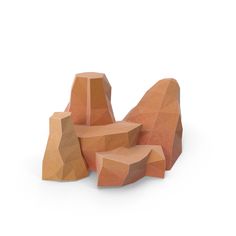 several pieces of wood sitting on top of each other in front of a white background