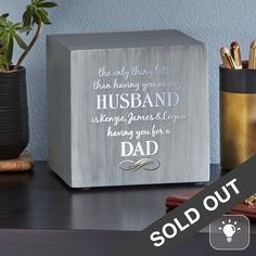 a wooden block that says, the only thing better than having your husband is being loved