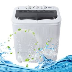 a washing machine with water splashing around it